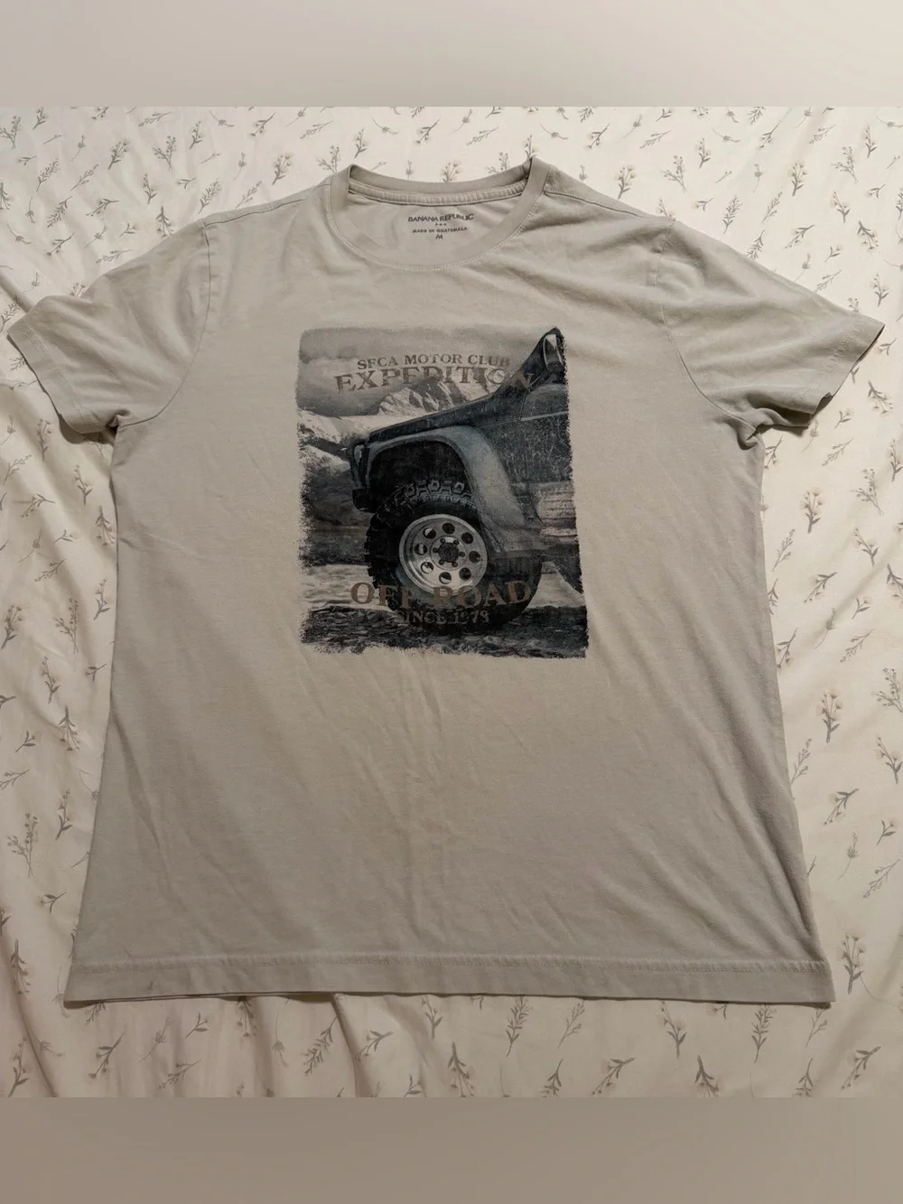 Off white tee with truck graphic